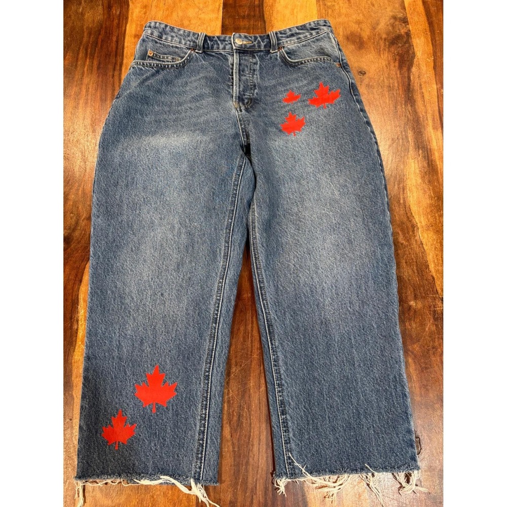 H&M straight leg jeans women US 10 blue red maple leaf graphic raw hem Canadiana